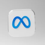 Een 3D-icoon met een blauw META-logo (voorheen Facebook) wordt weergegeven op een transparant vierkant met afgeronde randen. De achtergrond is een lichtgrijze gradiënt. Het ontwerp is eenvoudig en modern, met de nadruk op de aparte vorm en kleur van het oneindigheidssymbool tegen de neutrale achtergrond.